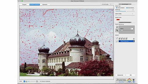 Staub und Kratzer werden automatisch erkannt und im Bild markiert.