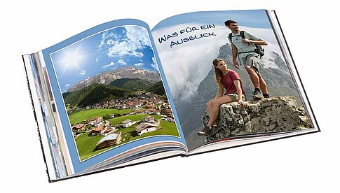 Eine der beliebtesten Präsentationsformen der Fotos nach der Rucksacktour: das CEWE Fotobuch. Cewe/Fotolia Thinkstock