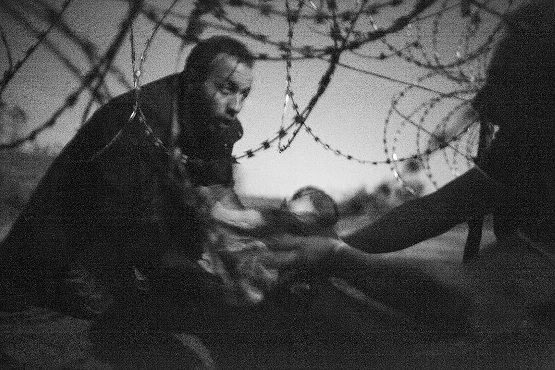 World Press Photo of the Year © Warren Richardson, Australien, 2015. Titel: Hope for a new life.